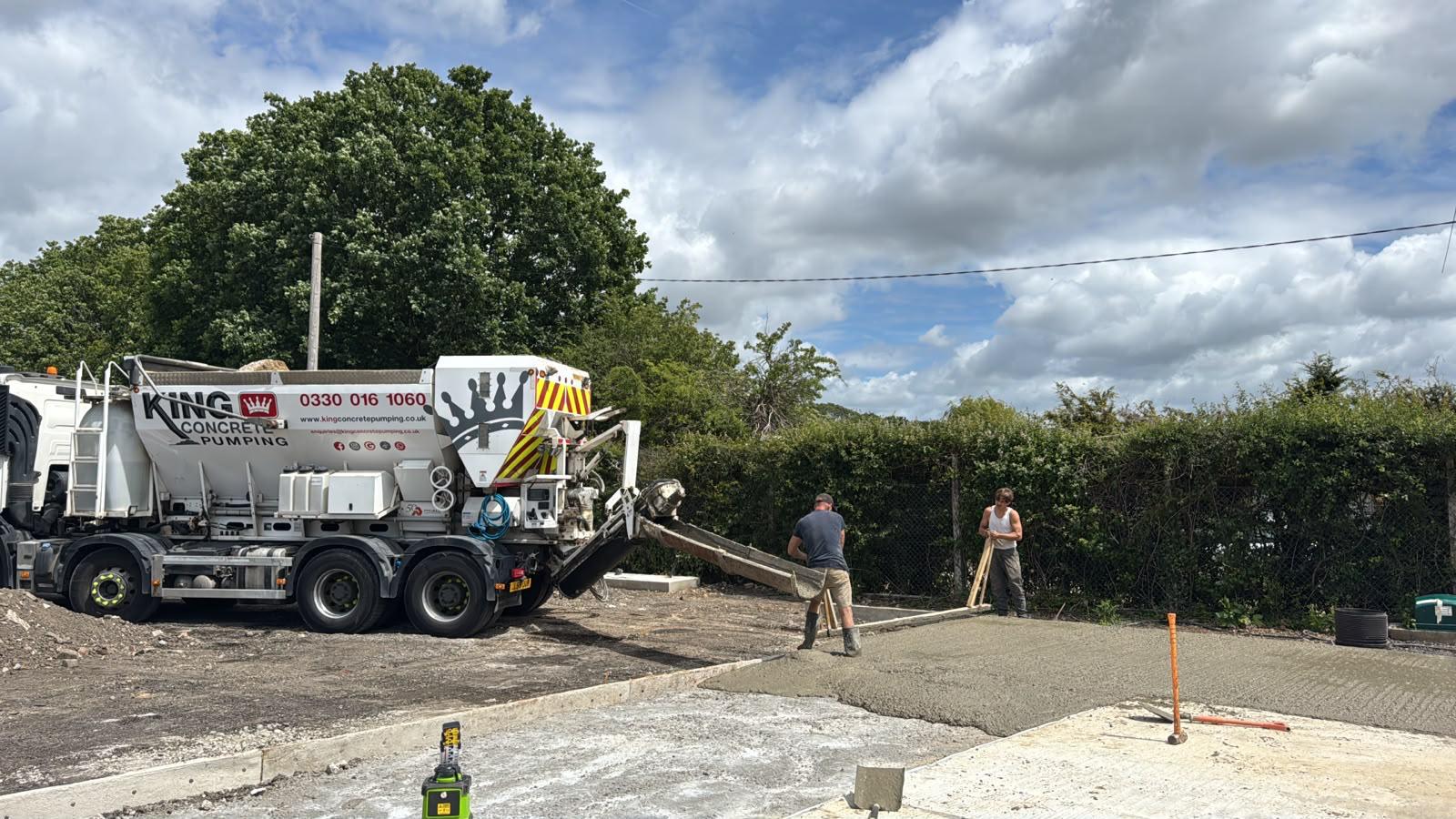 King Concrete Pumping crew placing concrete on a Epsom site